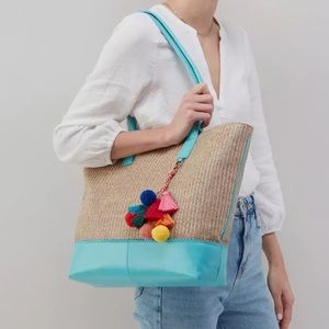 HOBO SHOPPER TOTE IN SOFT RAFFIA WITH LEATHER TRIM
